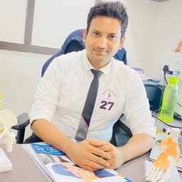 Dr. Nikhil Phade